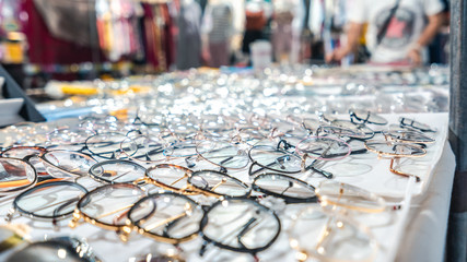 Close up focus panel fashion glasses in Asian night market
