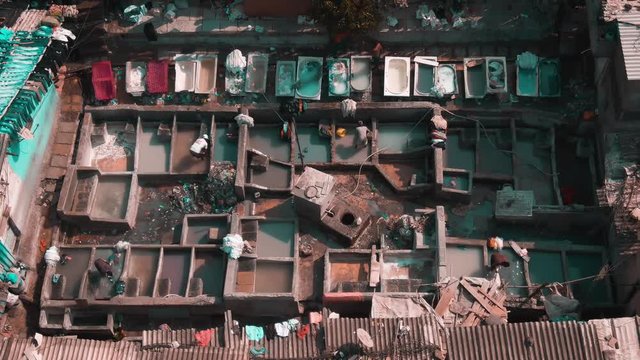 Mumbai, India, "dhobi ghats" slums near ocean, 4k aerial 