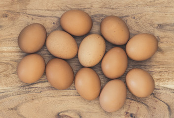 Eggs having a party on a wooden table