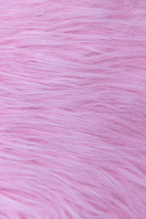 Fototapeta premium close-up of soft pink fluffy fur, wool, carpet texture background.