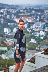 Woman overlooking the city view, Dalat, Vietnam