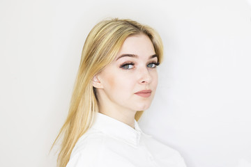 Fototapeta premium The girl's face is a blonde. Close-up. Facial care