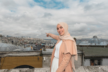 Portrait of beautiful Muslim woman in headscarf