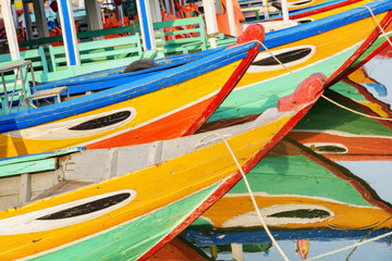 Fototapeta na wymiar View of colorful traditional Vietnamese tourist boats, Hoi An