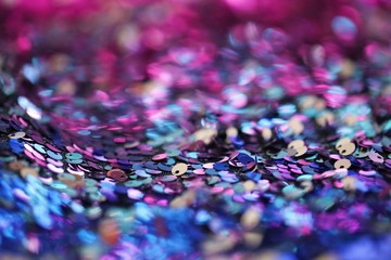 Sequins   multicolored blurred bokeh background.Shine fabric sequin. fabric in cold tones.Texture...
