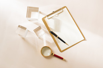 White Desktop. Mock up product view table gold accessories. stationery supplies. glamour style. Gold stapler