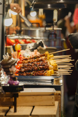 meat on grill,Barbecued Pork Kebab with vegetables,Assorted delicious grilled meat with vegetable . 