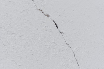 Texture, wall, concrete, it can be used as a background. Wall fragment with scratches and cracks