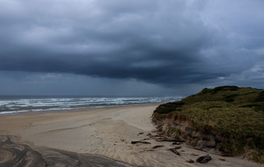 Dark storm clouds over Ocean Beach Tasmania