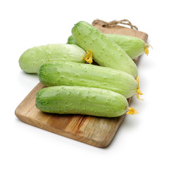 Green cucumber on the white background