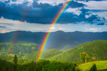 Mountains and rainbow