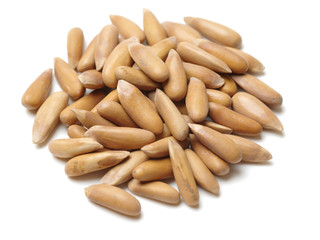 Pine nuts on white background