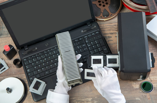 hand photographer digitize film slide for saving