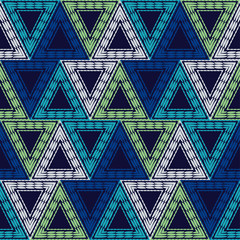Trendy seamless pattern designs. Triangles of ethnic stripes. Vector geometric background. Can be used for wallpaper, textile, invitation card, wrapping, web page background.