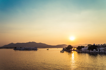 Pichola lake and Taj Lake Palace sunset in Udaipur, India