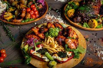 Fried chicken wings and French fries. Menu