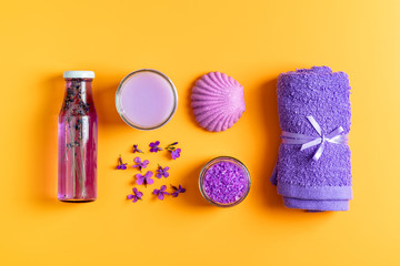 Spa products. Flat lay violet purple concept.