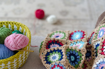 Multicolored plaid squares of crocheted