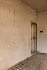 damaged door in old building