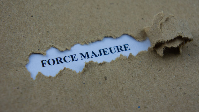 Torn Paper With Text Force Majeure