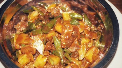 Chicken with black sauce (Ayam masak kicap) - A kind of Malay traditional dish. Selective focus.