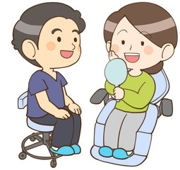 鏡で自分の口の中を見る患者さん