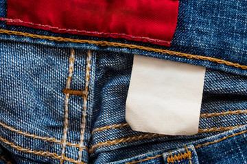 Blue denim jeans with clothing label