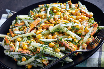 cucumber corn cheese salad on a plate