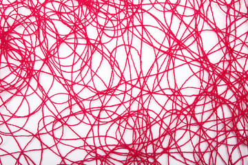 red threads on white background