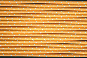 Yellow paper straws background