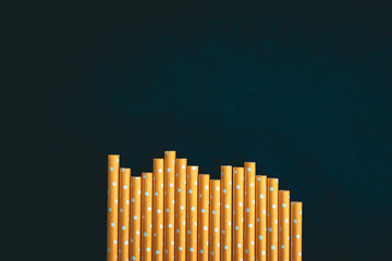 Yellow paper straws background