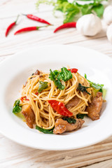 stir-fried spaghetti with chicken and basil