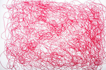 red threads on white background