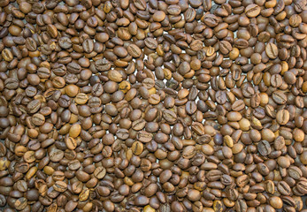 Cup of coffee beans, Scattered coffee beans around the cup