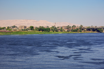 Fototapeta na wymiar The Nile with the Luxor Bridge, seen from the right bank