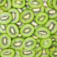 Fototapeta premium Kiwi slices as background
