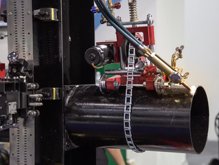Chain track pipe welding machine operate on pipeline. Industrial construction