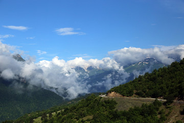 Naklejka premium View of the snow-capped peaks of the Caucasian mountains in the Upper Svaneti region, Georgia.