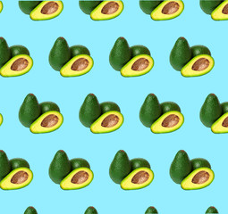 Avocado pattern on color background. Top view. Banner. Pop art design, creative summer food concept