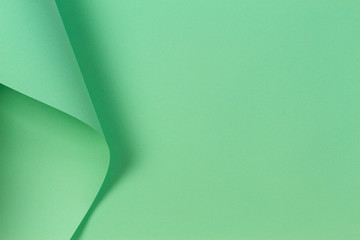 Abstract geometric shape pastel green paper background
