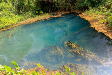 Obraz premium Natural hot spring in tropical deep forests in Thailand