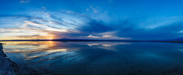 Fototapeta premium Sunset huge panorama with cloudscape at Chaxa lagoon, Atacama