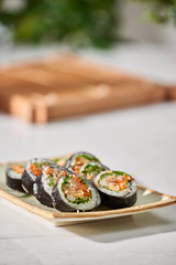 Korean roll Gimbap(kimbob) made from steamed white rice (bap) and various other ingredients