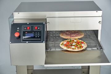 Industrial electric pizza oven for catering. Professional kitchen equipment
