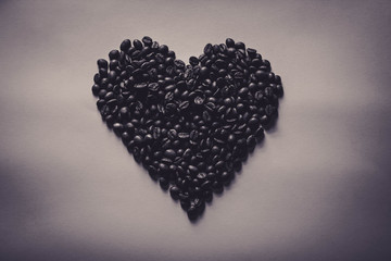 monochrome coffee hearth on light background with copy space