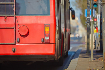 Public transportation / bus in urban surroundings on the street.