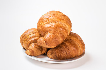  Breakfast three croissants on a white background