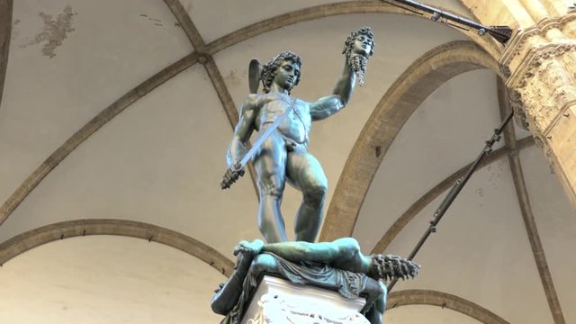 Famous Perseo and Medusa statue by artist Cellini in front of Loggia Dei Lanzi, Florence, Tuscany, Italy. Things to do in Italy, best place to visit, Firenze sightseeing, tourism destination