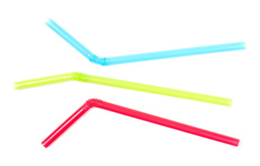 Colorful drinking straws isolated on white background, top view