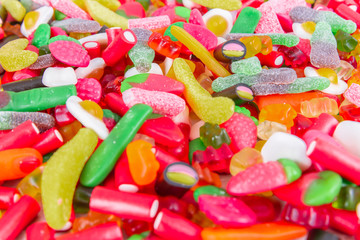Assorted mix of colorful candies and gummy bears